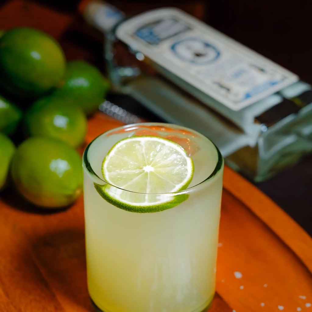A Margarita Furtivo with limes and coarse salt